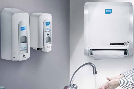 Clean washroom with hygiene dispensers