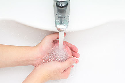 Person washing hands