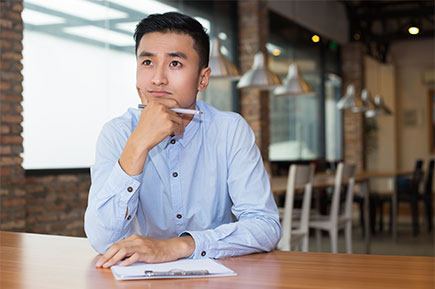 Man thinking about a business project.