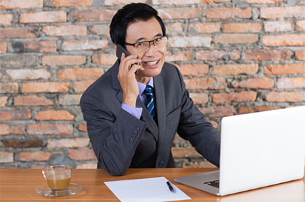 Businessman talking on phone.