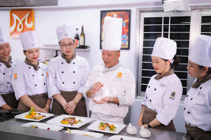 asian chef wearing white uniform